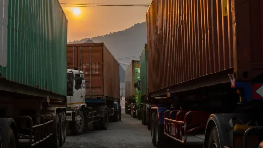 trucks-with-shipping-containers-at-sunset-2026-09-21-13-14-03-utc